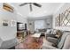 Comfortable living room with a sectional sofa, stylish decor, and a view of the neighborhood through the window at 1015 Michigan Nw Ave, Atlanta, GA 30314