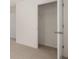 A bright, walk-in closet with a shelf for ample storage at 1079 Blue Juniper Cir, Loganville, GA 30052