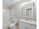 Updated bathroom with a shower and granite vanity at 1107 Sanfords Walk, Tucker, GA 30084