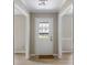 Entryway with wood-look floors and natural light at 1107 Sanfords Walk, Tucker, GA 30084