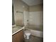 Bathroom featuring a tub with a shower at 13101 Waldrop Cv, Decatur, GA 30034