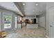 Well-lit kitchen features stainless steel appliances, black countertops, and convenient island at 5080 Firelight Ln, Alpharetta, GA 30022