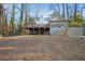 A large backyard with ample room for recreation and a view of the house at 5664 Colton Dr, Atlanta, GA 30342