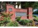 The Barrington community sign is displayed among flowers and plants at 6101 Providence Way, Union City, GA 30291