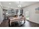 Well-equipped kitchen with gray cabinets, stainless steel appliances, and granite countertops at 6101 Providence Way, Union City, GA 30291