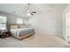 Spacious bedroom with ample natural light, ceiling fan, and neutral carpet at 6101 Providence Way, Union City, GA 30291