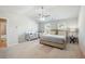 Large bedroom with natural light, ceiling fan, and ample space for Bedroom at 6101 Providence Way, Union City, GA 30291