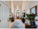 Bright foyer with hardwood floors, a high ceiling, and a decorative chandelier at 175 Hampstead Mnr, Fayetteville, GA 30214