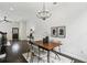 Dining area with modern chandelier and hardwood floors at 611 Irwin Ne St, Atlanta, GA 30312