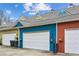 Colorful garages in a row with yellow, blue and red accents at 611 Irwin Ne St, Atlanta, GA 30312