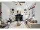 Bright living room featuring a fireplace, built-in shelves, and modern decor at 611 Irwin Ne St, Atlanta, GA 30312