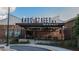 Exterior view of Krog Street Market featuring an outdoor seating area at 611 Irwin Ne St, Atlanta, GA 30312