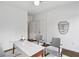 Well-lit office space with neutral tones, two chairs, a white desk, and minimalist decor, creating a serene atmosphere at 611 Irwin Ne St, Atlanta, GA 30312