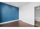 Bedroom with an ensuite bathroom featuring hardwood floors and a modern design at 975 Moda Dr, Atlanta, GA 30316