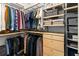Spacious walk-in closet with custom shelving and storage solutions at 975 Moda Dr, Atlanta, GA 30316