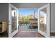 Inviting deck with wood flooring, outdoor furniture and umbrella, perfect for relaxing and entertaining at 975 Moda Dr, Atlanta, GA 30316