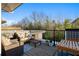Cozy outdoor deck with comfortable seating and table, perfect for relaxation and enjoying the view at 975 Moda Dr, Atlanta, GA 30316