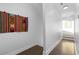 Hallway with hardwood floors and bright lighting at 975 Moda Dr, Atlanta, GA 30316
