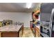 Kitchen area with stainless steel appliances, stone countertops, and ample cabinet space at 1155 Magnolia Gardens Walk, Mcdonough, GA 30253