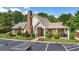 Community clubhouse with brick facade and ample parking at 3916 Abbott Way # 2, Powder Springs, GA 30127