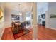 Charming dining room with a tray ceiling and an open layout to the living areas at 3916 Abbott Way # 2, Powder Springs, GA 30127