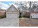 Charming home with a two-car garage, brick accents, and manicured landscaping at 3916 Abbott Way # 2, Powder Springs, GA 30127
