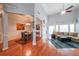 Open concept living room and dining area with hardwood floors at 3916 Abbott Way # 2, Powder Springs, GA 30127