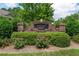 Community sign for Ashleigh Parc featuring lush greenery and colorful flowers at 3916 Abbott Way # 2, Powder Springs, GA 30127
