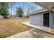 Exterior shows the backyard, siding, and backyard door to the home at 893 Brownwood Avenue Se Ave, Atlanta, GA 30316
