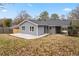 View of the backyard shows the deck, siding, and updated roof at 893 Brownwood Avenue Se Ave, Atlanta, GA 30316
