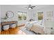 Beautiful bedroom with a ceiling fan, hardwood floors, and lots of natural light at 893 Brownwood Avenue Se Ave, Atlanta, GA 30316