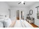 Sunny bedroom with hardwood floors, a walk-in closet, and lots of natural light at 893 Brownwood Avenue Se Ave, Atlanta, GA 30316