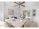 Bright office space features a ceiling fan and direct access to the bedroom with glass paneled french doors at 893 Brownwood Avenue Se Ave, Atlanta, GA 30316