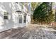 Backyard deck features a view of mature trees and access to the home, perfect for relaxing outdoors at 995 Brighton Cove Trl, Lawrenceville, GA 30043