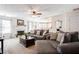 Bright living room featuring a fireplace, neutral decor, and comfortable seating at 995 Brighton Cove Trl, Lawrenceville, GA 30043