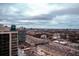 City view of a skyline, highway system, and high-rise buildings under a cloudy sky at 1280 W Peachtree Nw St # 3709, Atlanta, GA 30309