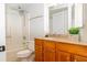 Bathroom with vanity, granite countertop, and shower over tub at 1280 W Peachtree Nw St # 3709, Atlanta, GA 30309