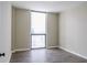Neutral bedroom featuring a large window with lots of natural light at 1280 W Peachtree Nw St # 3709, Atlanta, GA 30309