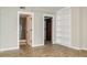 Bedroom with neutral paint and an entry to the bathroom and closet space at 1280 W Peachtree Nw St # 3709, Atlanta, GA 30309
