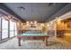 A billiards room with pool tables, comfortable seating, and elegant decor at 1280 W Peachtree Nw St # 3709, Atlanta, GA 30309