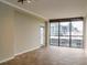 Spacious living room with large windows offering city views at 1280 W Peachtree Nw St # 3709, Atlanta, GA 30309