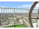 View from the balcony showing city skyline and buildings with an outdoor chair in foreground at 250 Pharr Ne Rd # 1618, Atlanta, GA 30305