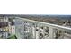 Balcony with city view shows lush greenery and buildings in the distance at 250 Pharr Ne Rd # 1618, Atlanta, GA 30305