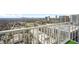 Wide view from balcony of a cityscape, showing lush greenery and buildings in the distance at 250 Pharr Ne Rd # 1618, Atlanta, GA 30305