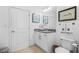 Clean bathroom with a vanity, a toilet, a sink, and a mirror at 250 Pharr Ne Rd # 1618, Atlanta, GA 30305