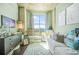 Charming Bedroom featuring a cozy crib, comfortable seating, and delightful decor creating a soothing environment at 250 Pharr Ne Rd # 1618, Atlanta, GA 30305