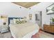 Comfortable bedroom featuring a king bed, stylish decor, and an ensuite bathroom for added convenience at 250 Pharr Ne Rd # 1618, Atlanta, GA 30305