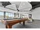 Upscale game room featuring a billiard table, stylish lighting, and comfortable seating at 250 Pharr Ne Rd # 1618, Atlanta, GA 30305