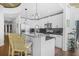 Modern kitchen features white cabinets, granite countertops, and stainless steel appliances at 250 Pharr Ne Rd # 1618, Atlanta, GA 30305