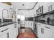Modern kitchen features stainless steel appliances, granite countertops, and designer finishes at 250 Pharr Ne Rd # 1618, Atlanta, GA 30305